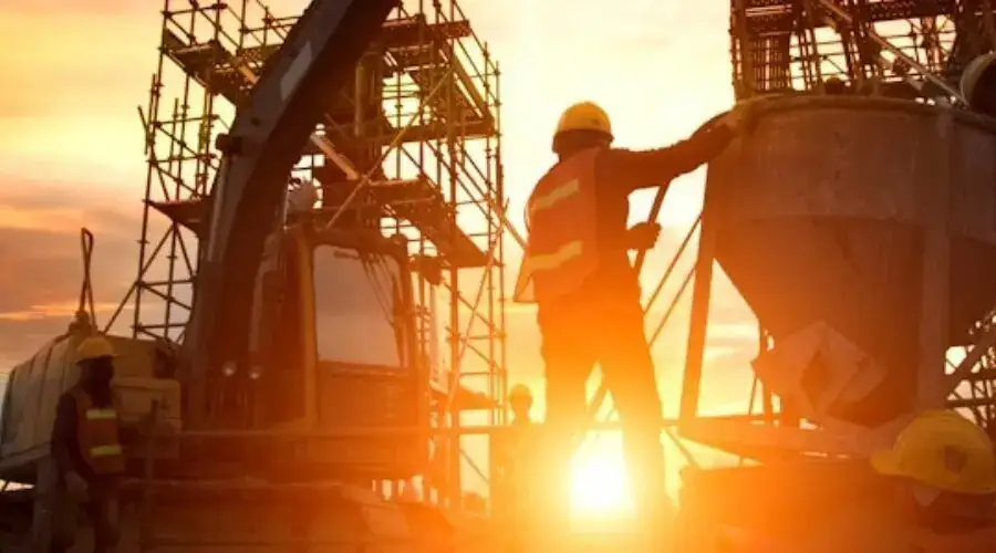 Construction scene at sunset